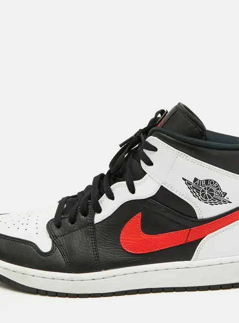 Air Jordans Black/White Leather Jordan 1 Mid Sneakers Size 46