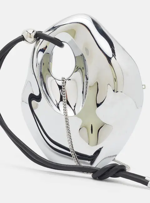 PUBLISHED BY Phil's Third Eye Silver Metal Shoulder Bag