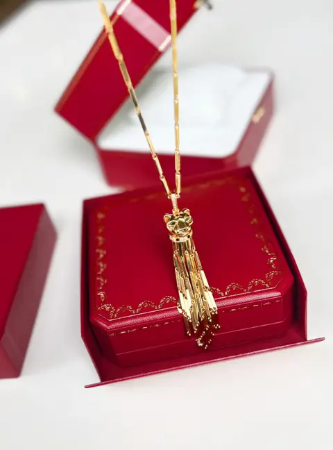 Cartier Panthere de Cartier 18K Yellow Gold Emerald Onyx Tassel Necklace
