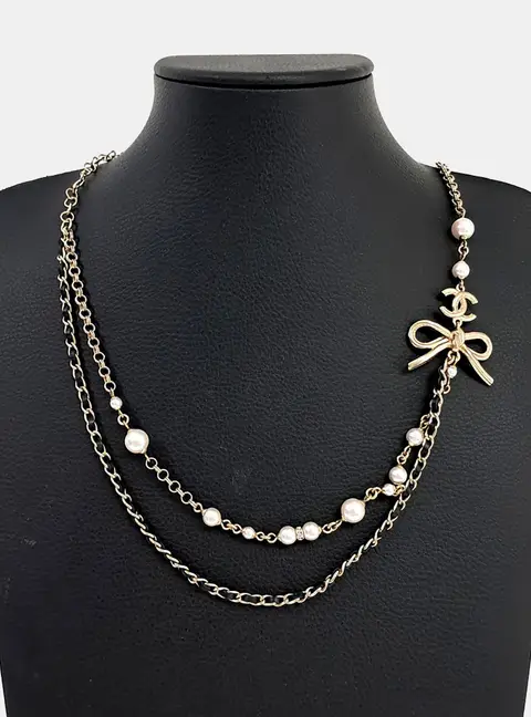 Chanel Metal ribbon pearl necklace