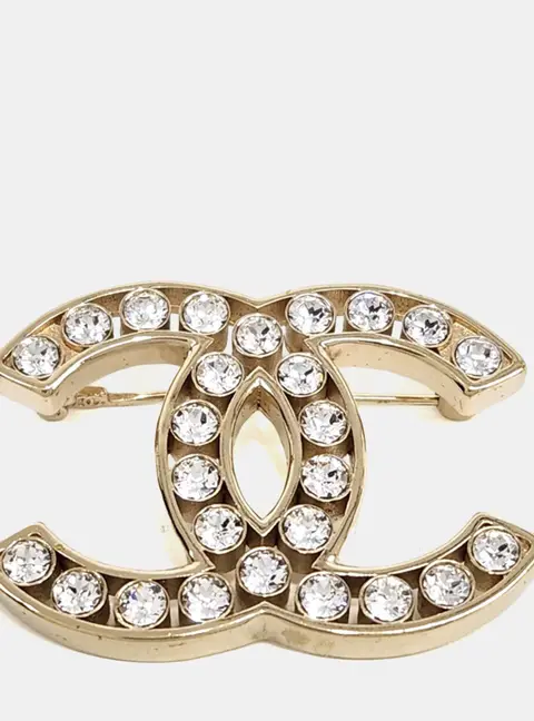 Chanel lMetal ogo brooch
