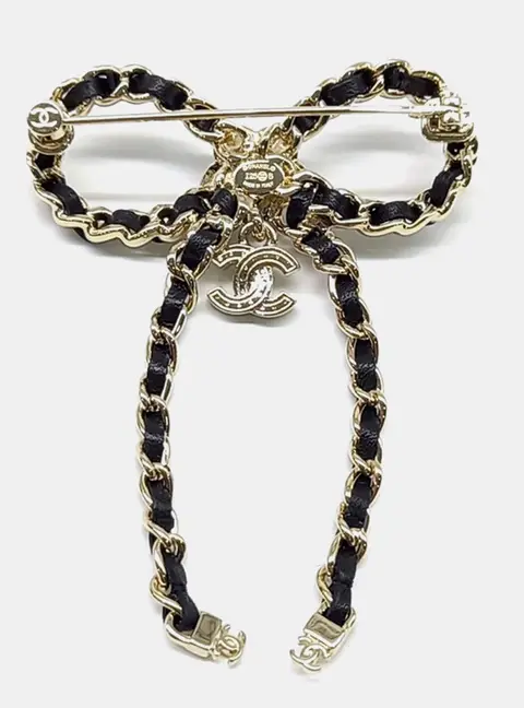 Chanel ribbon brooch
