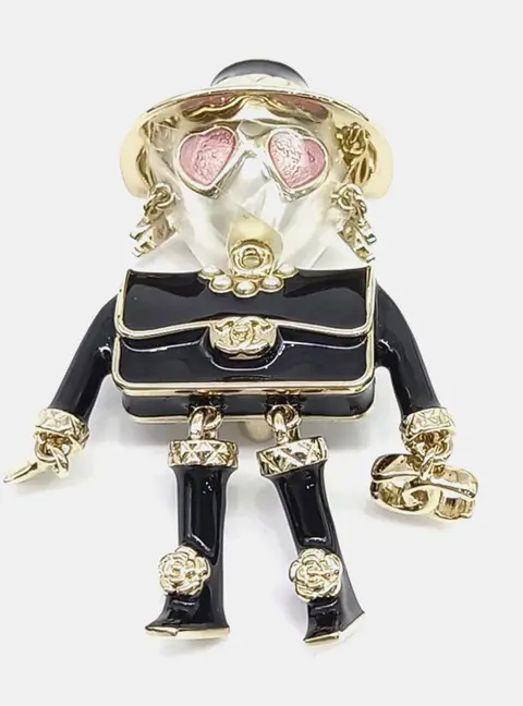 Chanel metal brooch