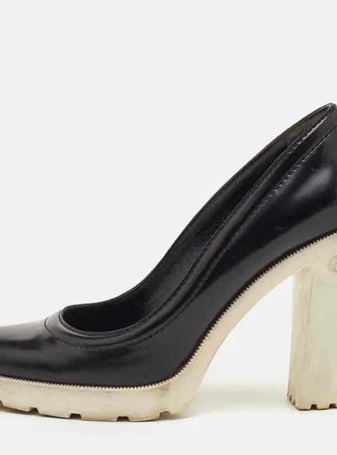Gucci Size 37 Black Leather Round Toe Platform Pumps