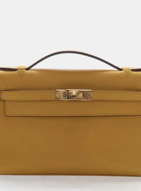 Hermes Jaune Ambre Swift Kelly Pochette Top Handle Bag