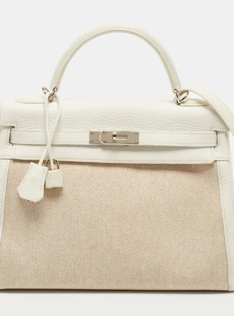Herm&egrave;s Kelly Retourne 32 Palladium Finish Blanc/Ecru Taurillon Clemence Leather and Toile Top Handle Bag