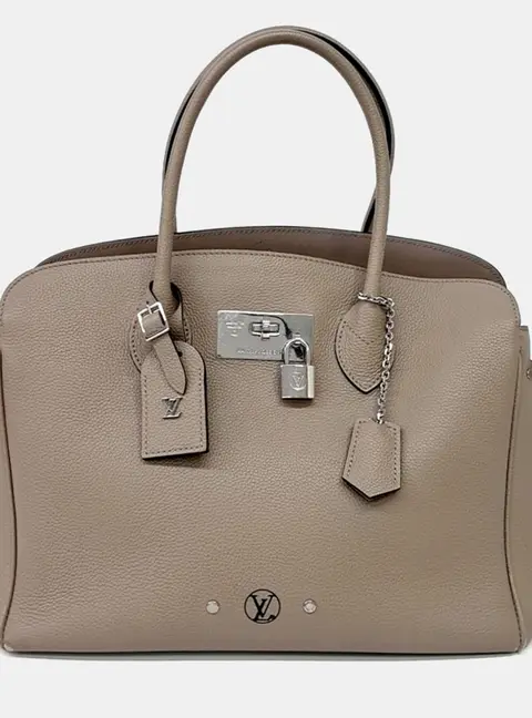 Louis Vuitton Beige Leather Mila MM