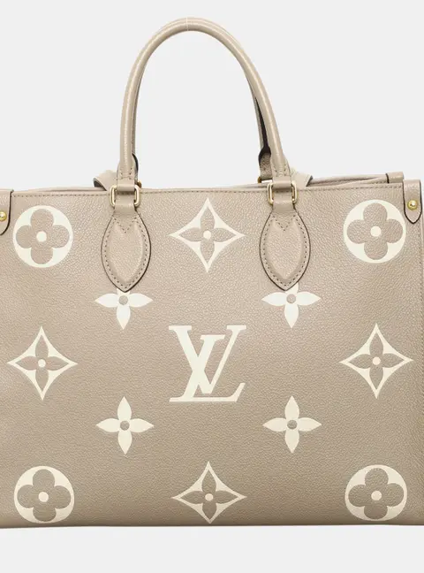 Louis Vuitton On The Go MM Beige Bicolor Monogram Empreinte Leather Tote Bag