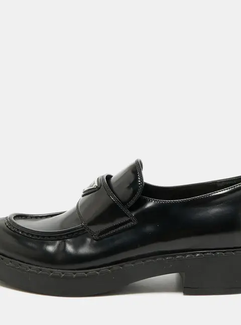 Prada Size 39.5 Black Leather Triangle Logo Plague Loafers