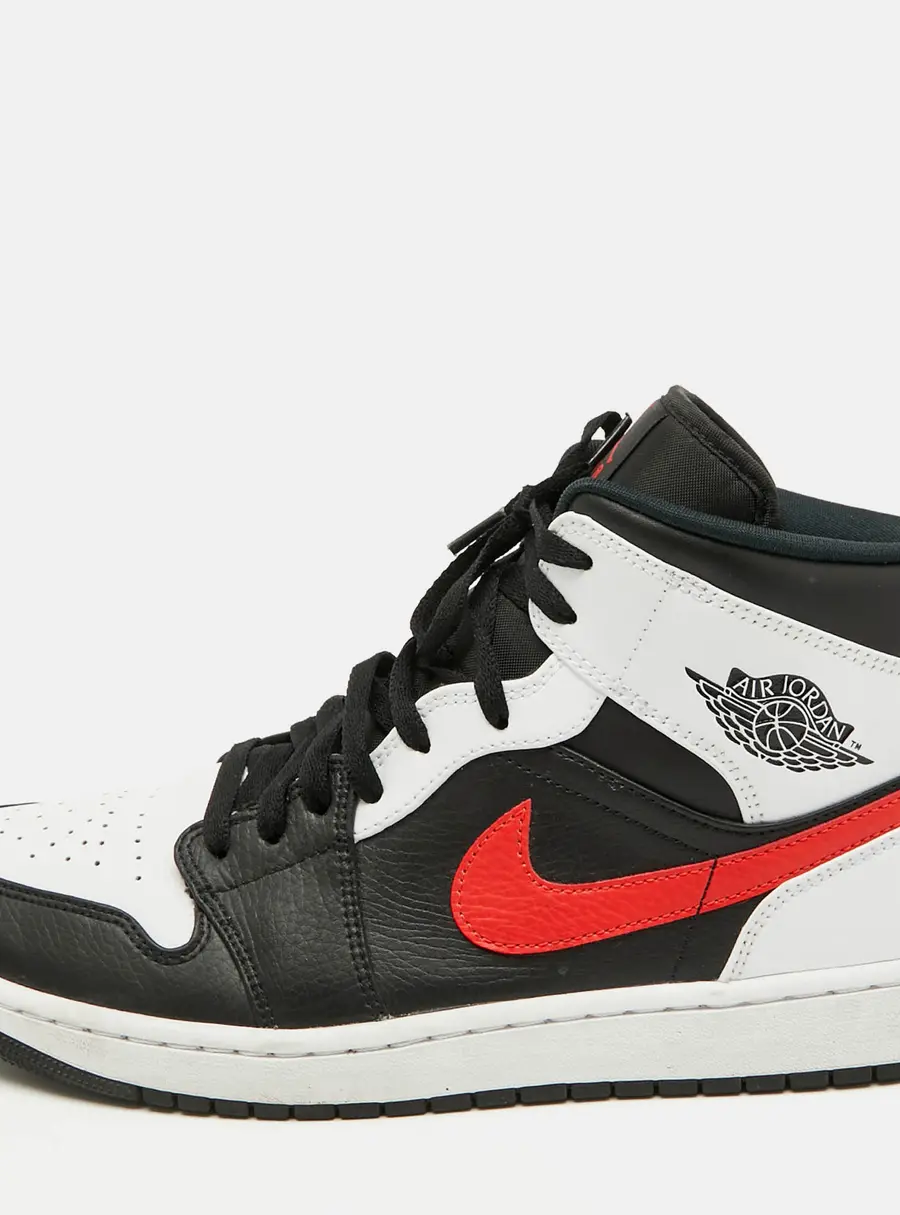 Air Jordans Black/White Leather Jordan 1 Mid Sneakers Size 46