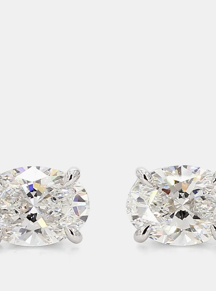 4.24 cts Oval Lab Grown Diamonds 14K White Gold 4 Prong Basket Studs