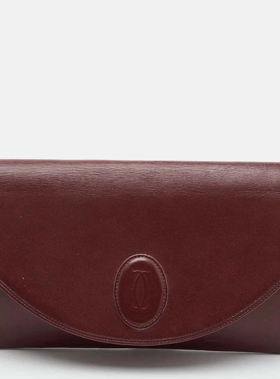Cartier Must de Cartier Burgundy Leather Oval Emblem Flap Clutch