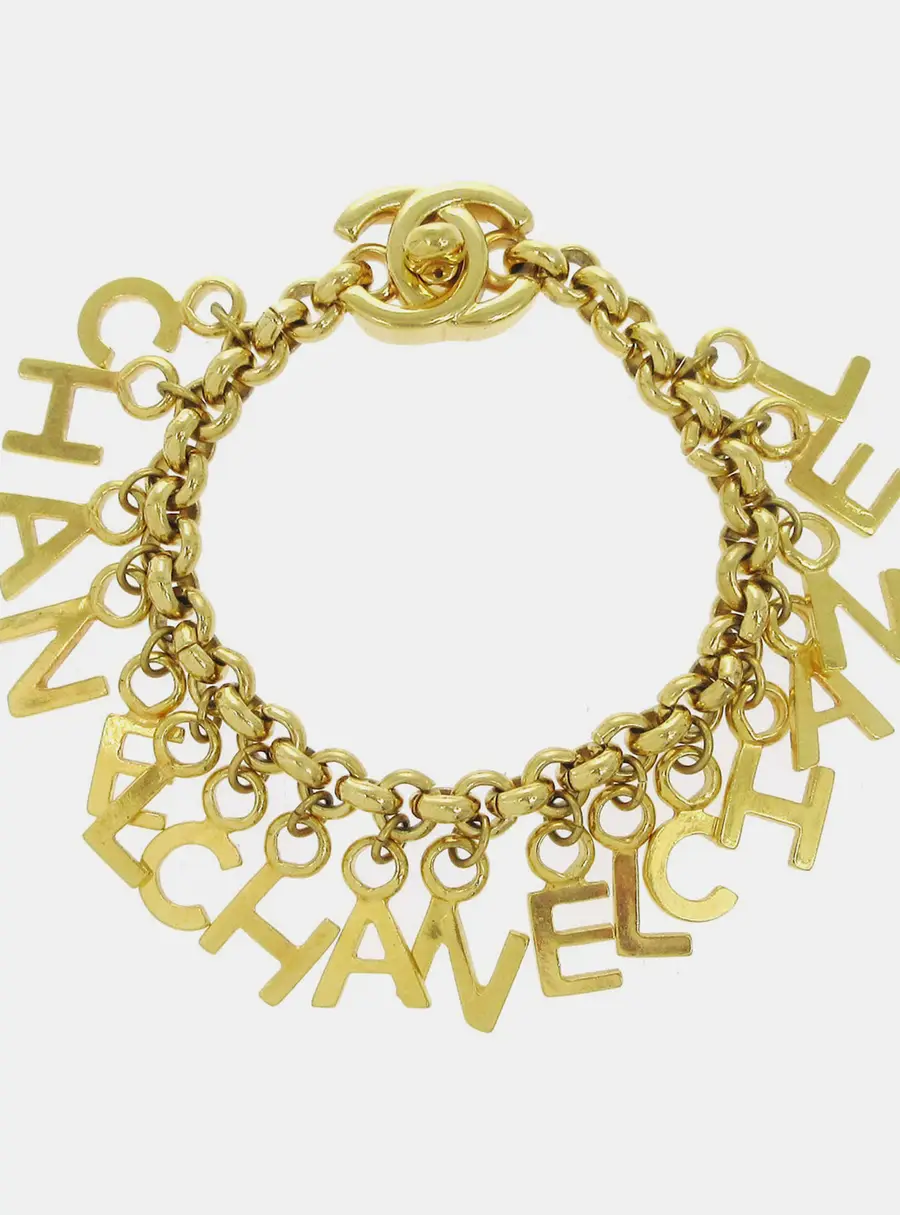 Chanel Vintage 1996 24k Gold Plated Multi -Letter Turnlock Women's Bracelet