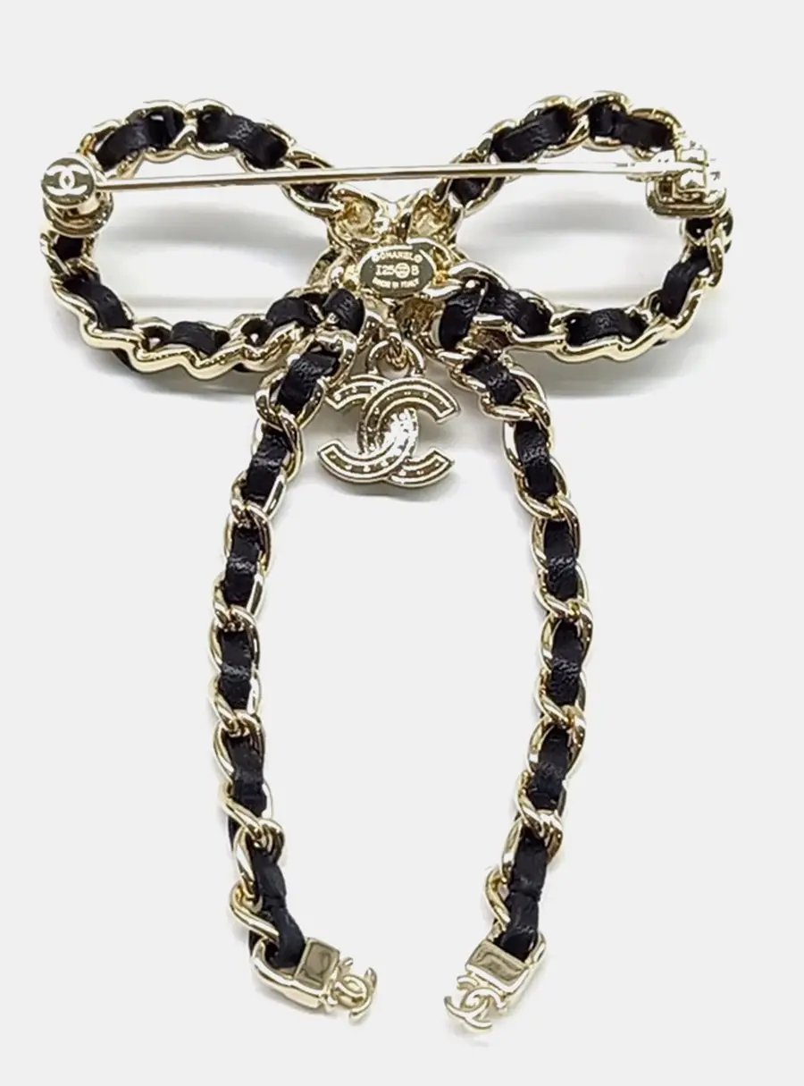 Chanel ribbon brooch