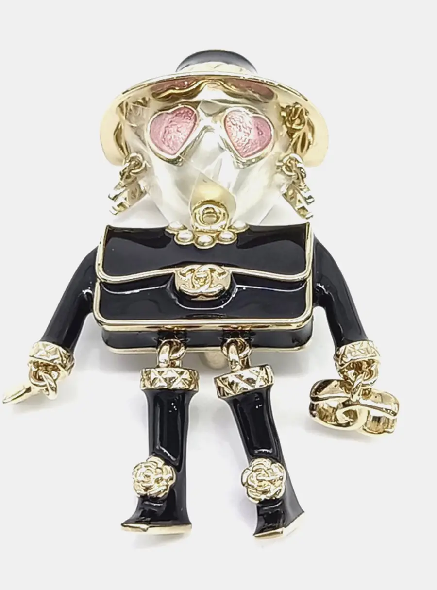 Chanel metal brooch
