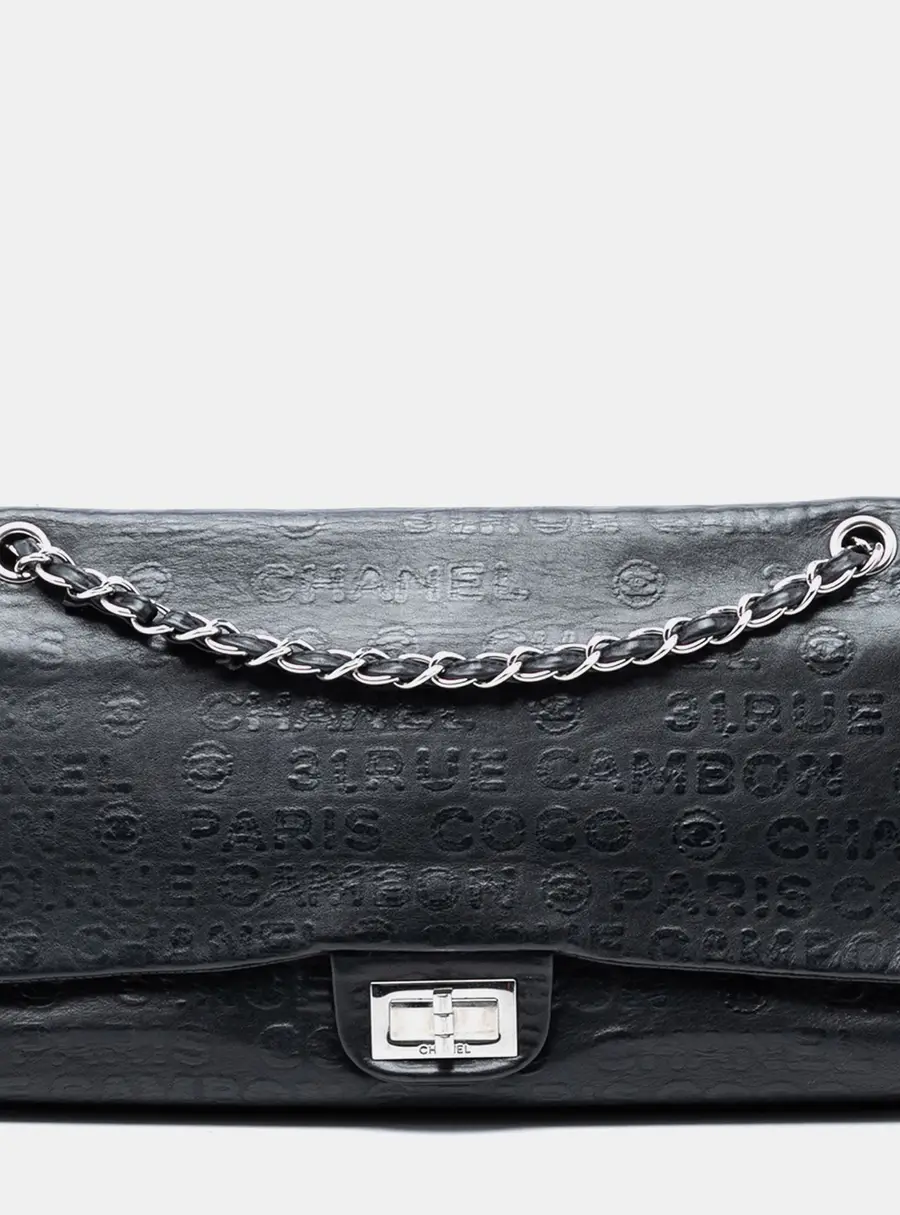 Chanel Reissue 2.55 Maxi Black Embossed Calfskin Leather Double Flap Bag