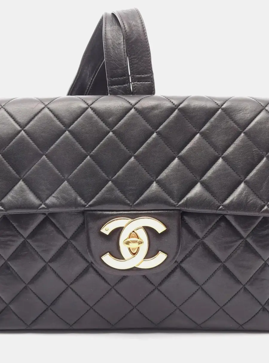 Chanel Vintage Quilted Jumbo Black Lambskin Leather Flap Backpack Bag