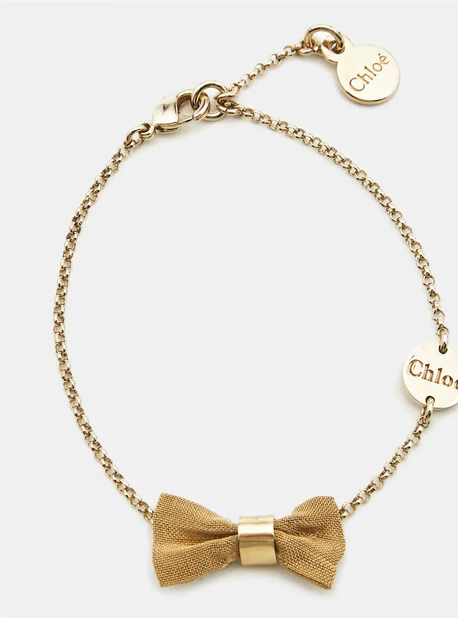 Chloe Bow Gold Tone Bracelet