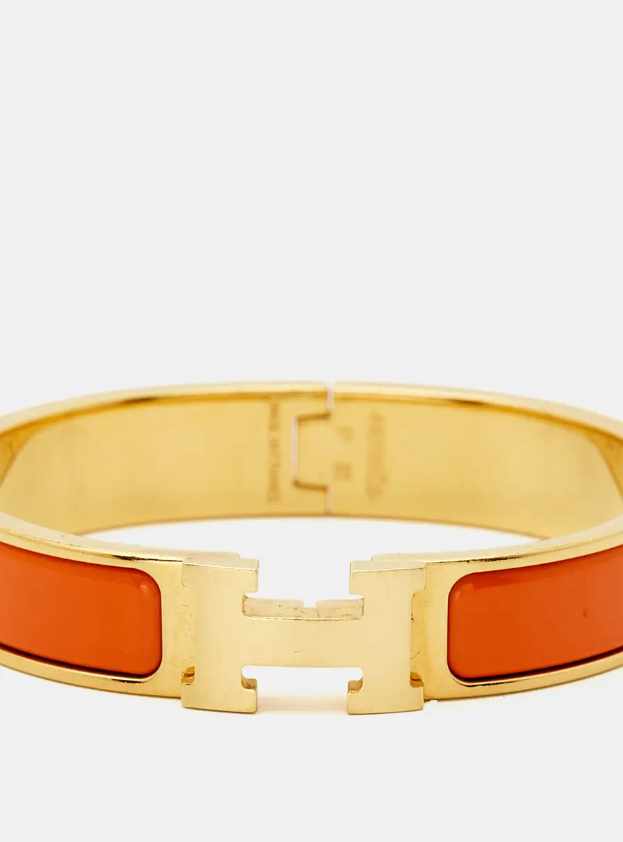 Herm&egrave;s Clic H Orange Enamel Gold Plated Bracelet