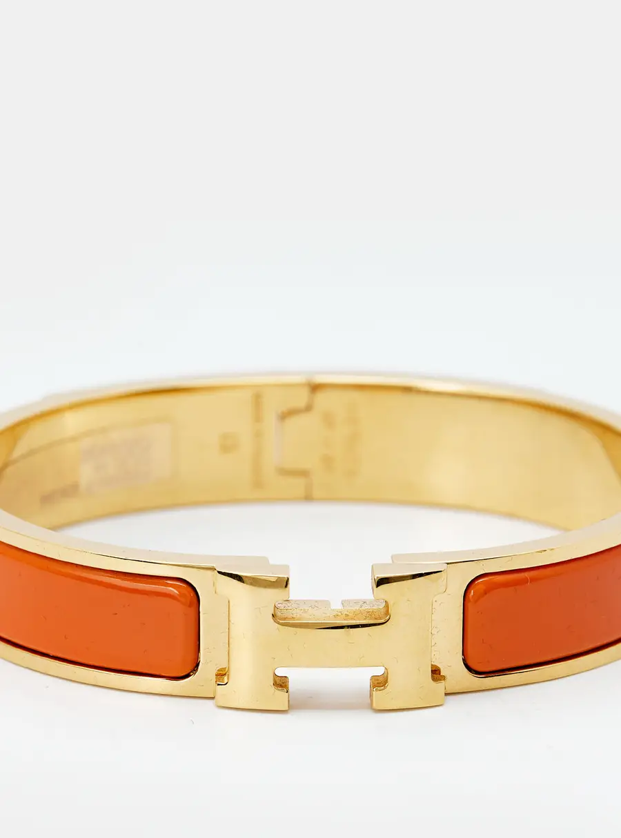Herm&egrave;s Clic H Orange Enamel Gold Plated Bracelet