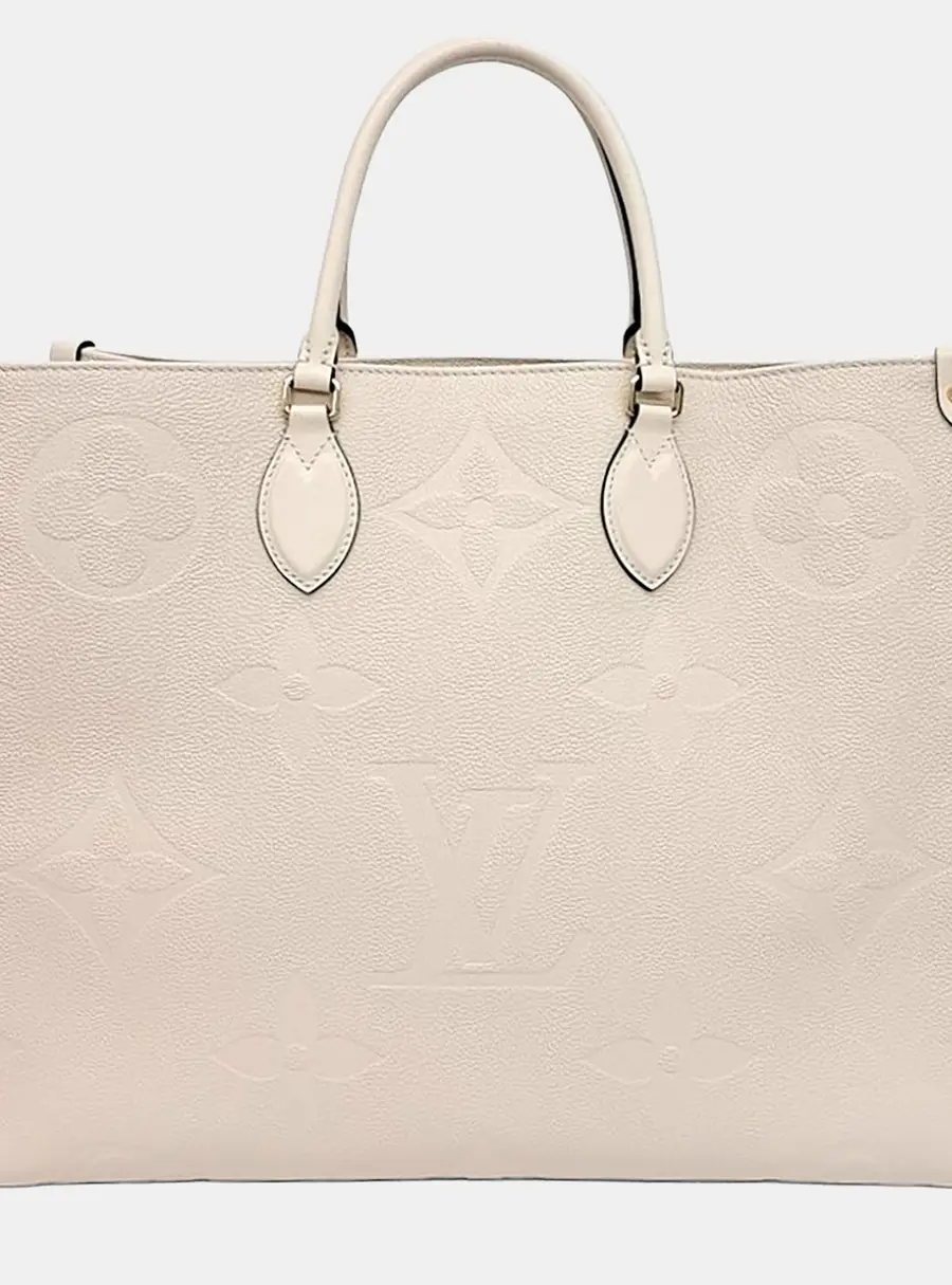 Louis Vuitton On The Go GM Beige Monogram Empreinte Leather Top Handle Bag