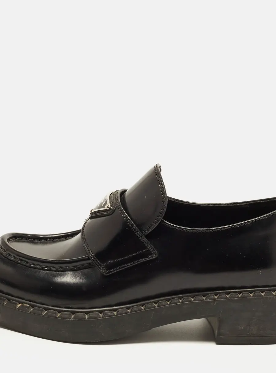 Prada Size 37 Black Leather Logo Plague Loafers