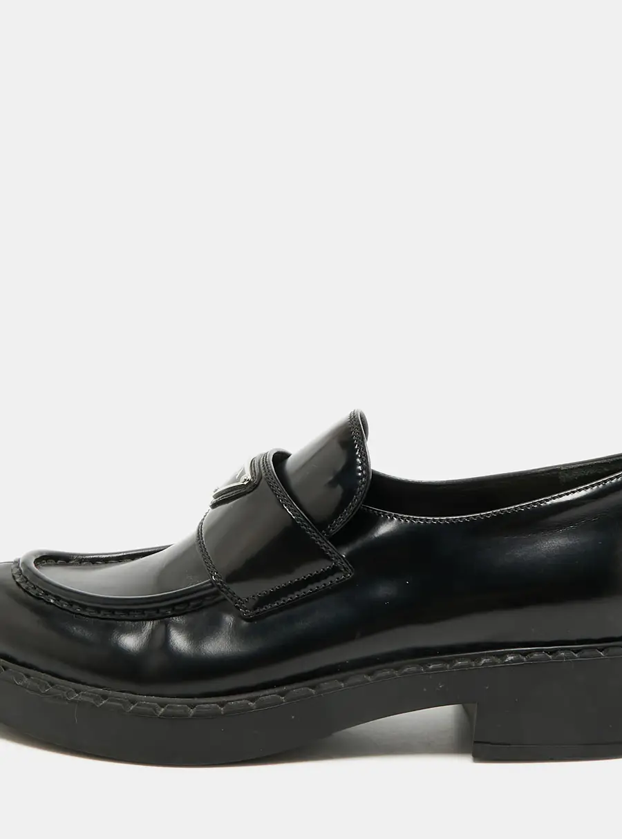 Prada Size 39.5 Black Leather Triangle Logo Plague Loafers